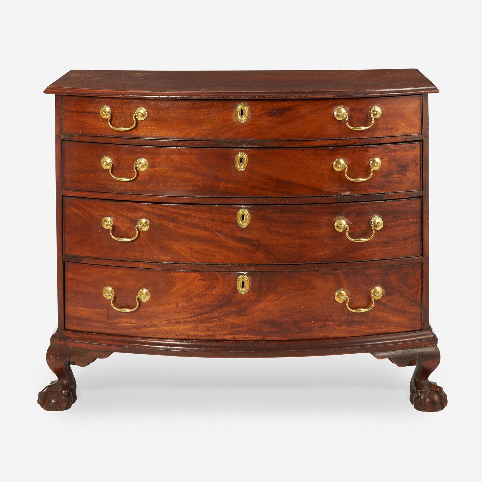 A Chippendale bowfront carved mahogany chest of drawers Probably Boston, MA, circa 1780 (1 of 2)