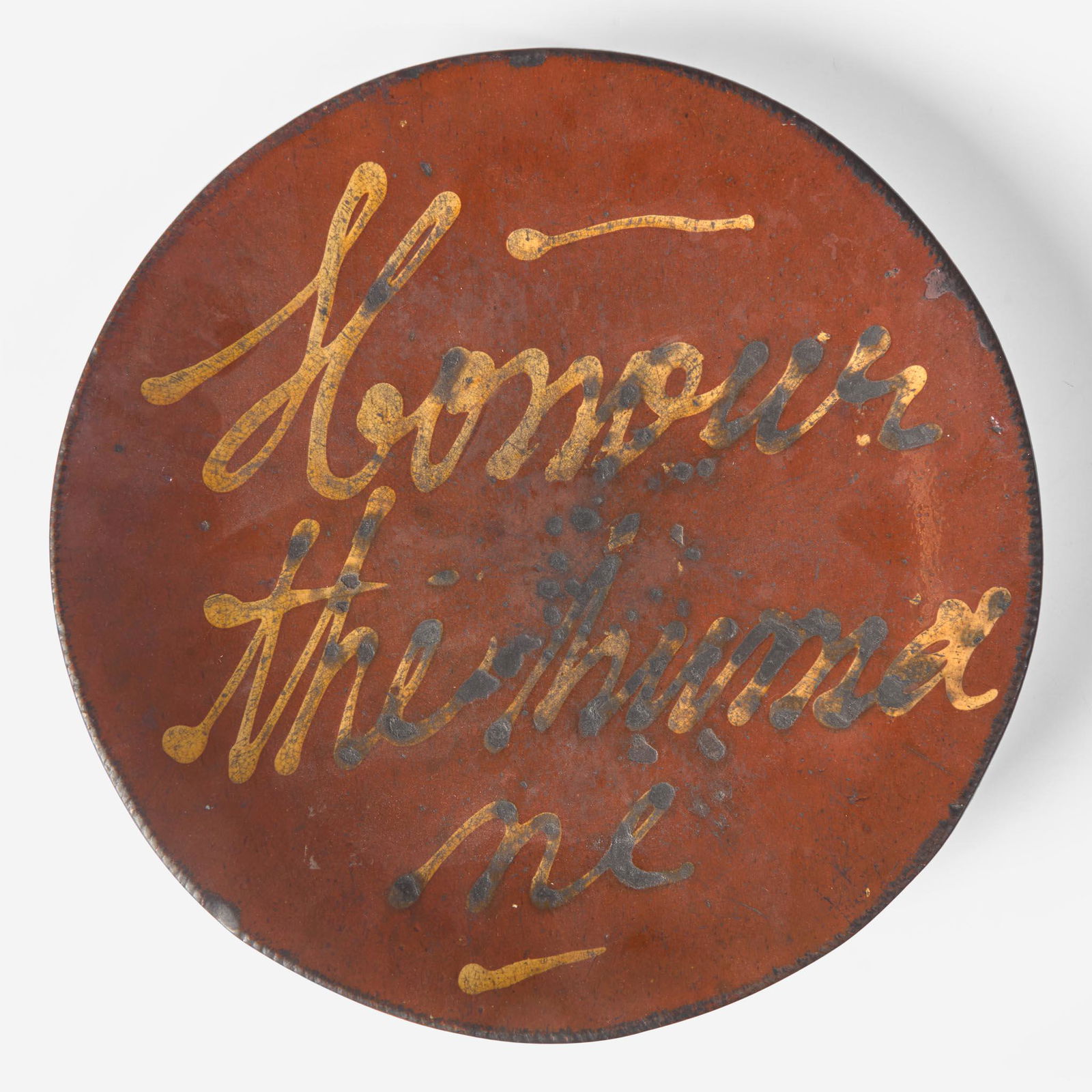 A slip-decorated and glazed redware dish 19th century (1 of 2)