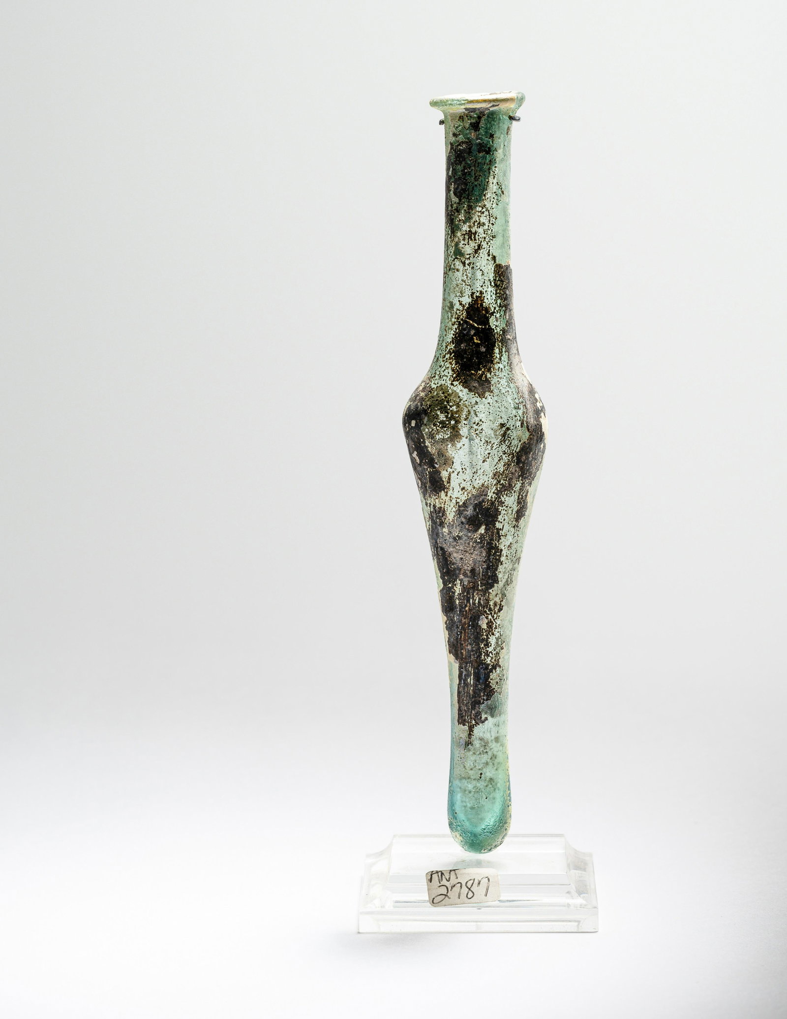 A Roman Pale Blue Glass Unguentarium : A Roman Pale Blue Glass Unguentarium Circa 3rd-4th Century A.D. Height 6 1/2 inches (16.5 cm). Provenance: Private Estate, Connecticut, acquired in the mid-1980s.
