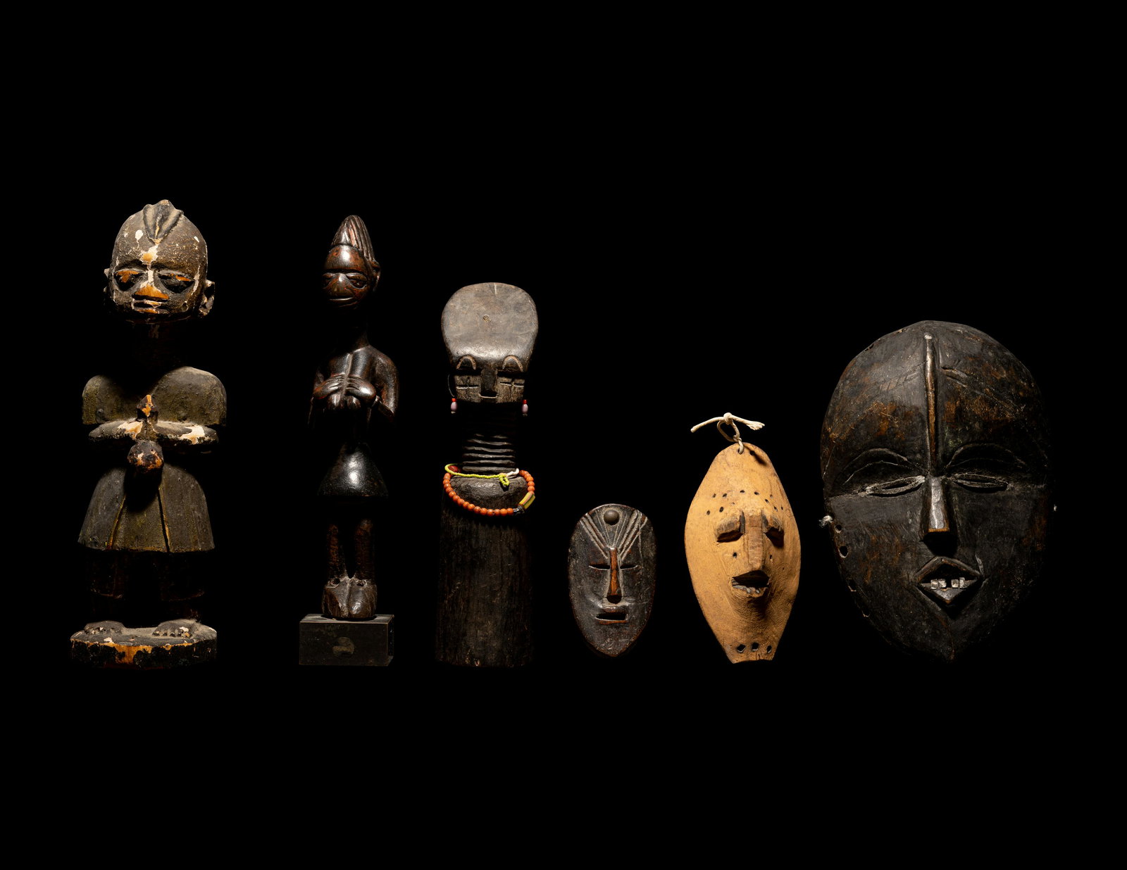 Three Dan Passport Masks, An Ashanti Wood Idol, and Two Wood Figures (1 of 5)