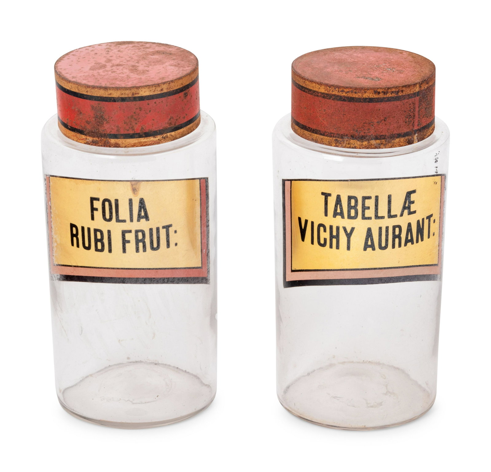 A Pair of Clear Glass Apothecary Jars: A Pair of Clear Glass Apothecary Jars with painted metal lids. Height 9 1/4 x diameter 5 inches.