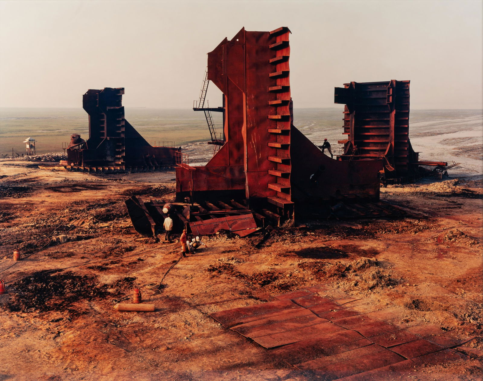 Edward Burtynsky (born 1955) Shipbreaking #27, with Cutter, Chittagong, Bangladesh, 2001: Edward Burtynsky (born 1955) Shipbreaking #27, with Cutter, Chittagong, Bangladesh, 2001 Archival pigment print, printed 2002, signed in ink and numbered '6/10' on a label affixed on the frame backing