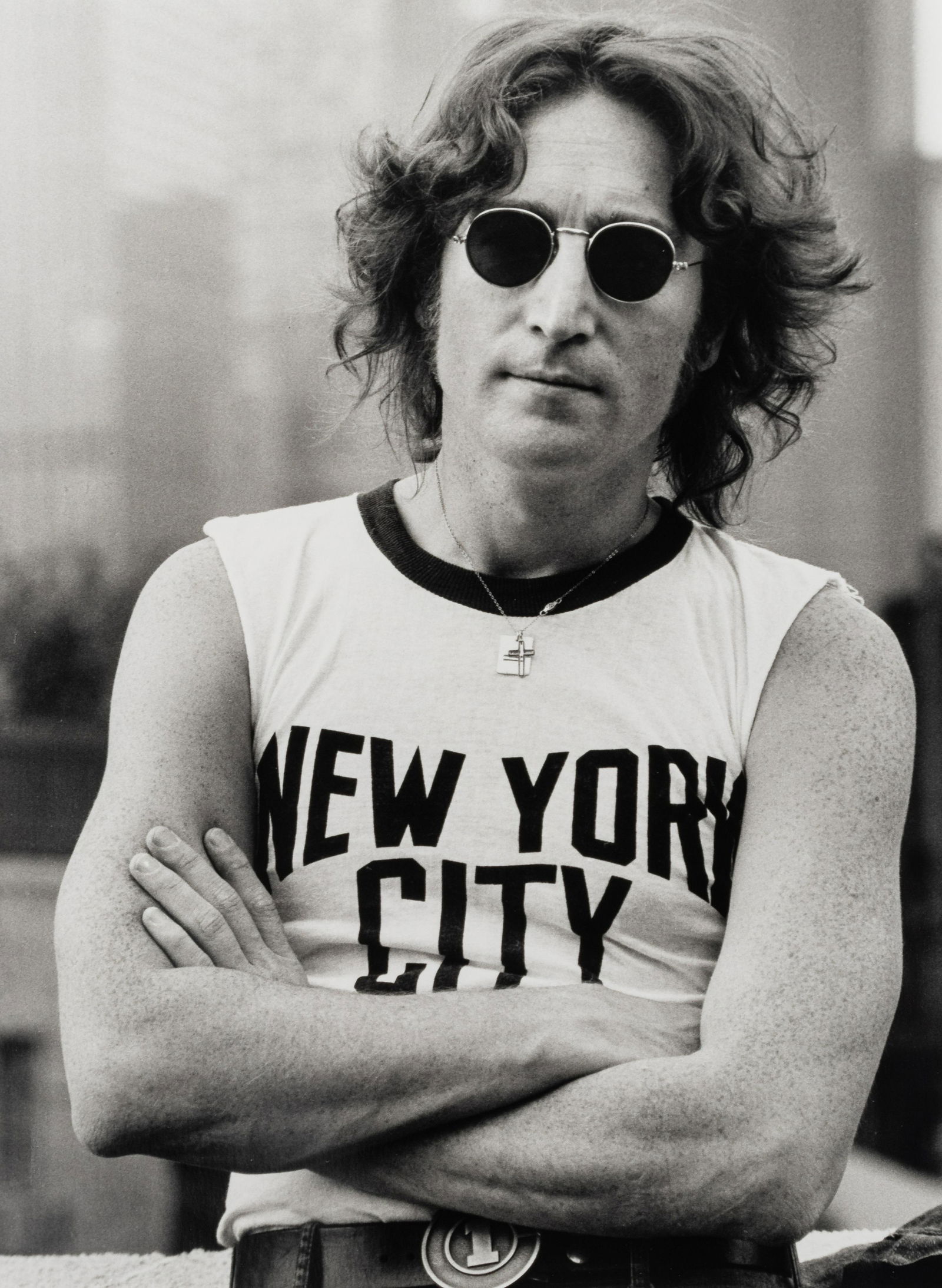 Bob Gruen (born 1945) John Lennon, NYC T-Shirt, 1974 : Bob Gruen (born 1945) John Lennon, NYC T-Shirt, 1974 Gelatin silver print, printed later, signed and titled in ink in the margin. image: 16 x 11in. (40.6 x 28cm.) sheet: 20 x 16in.