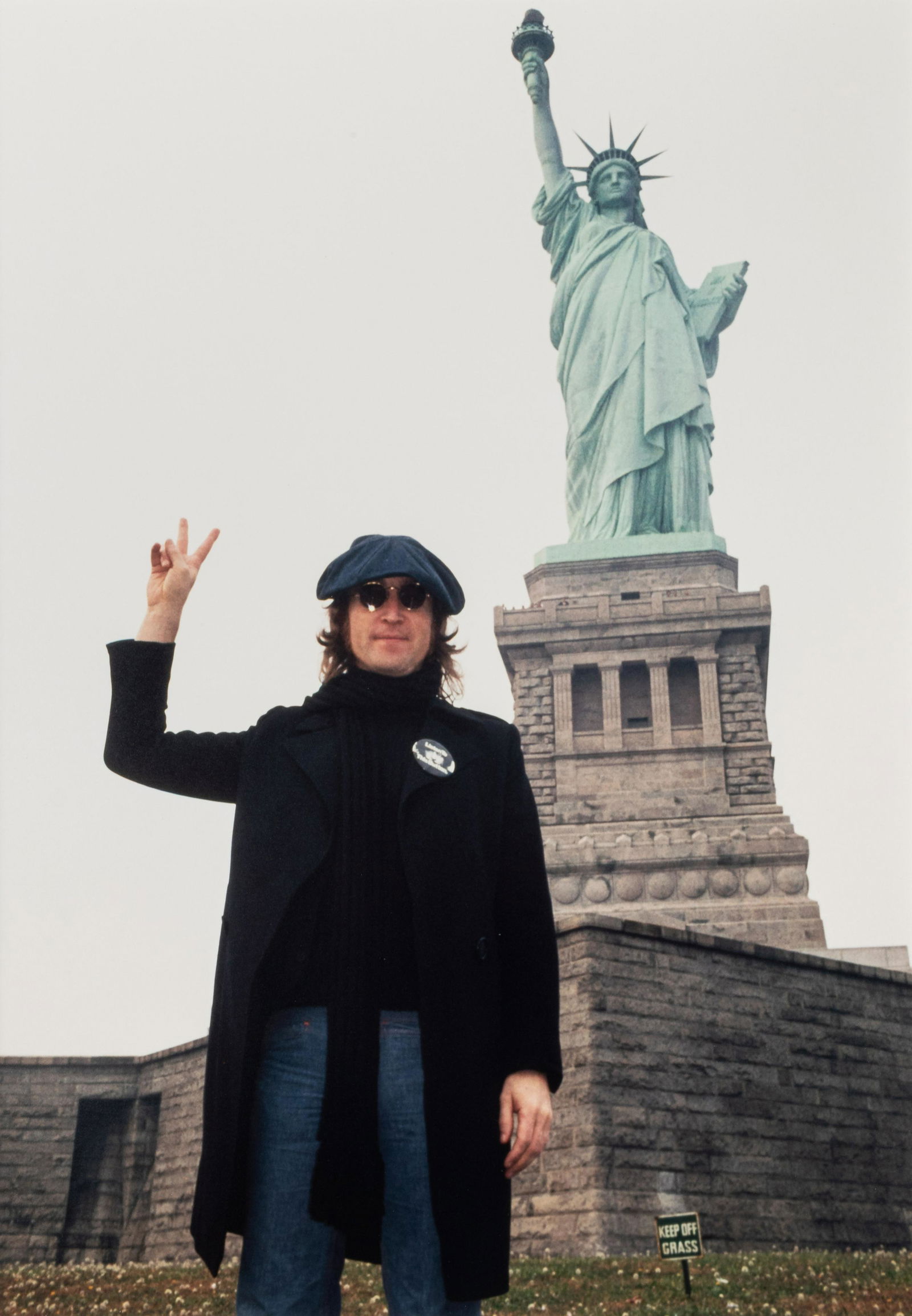 Bob Gruen (born 1945) John Lennon, Statue of Liberty, New York City, 1974 : Bob Gruen (born 1945) John Lennon, Statue of Liberty, New York City, 1974 Chromogenic print, printed later, signed, titled and numbered '23/150' in ink in the margin. image: 17 x 11 1/4in. (43.1 x 28.