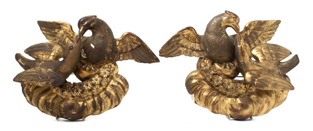 A Pair of Italian Giltwood Wall Appliques, Height : A Pair of Italian Giltwood Wall Appliques, each in the form of two doves with a wreath. Height 10 3/4 inches.