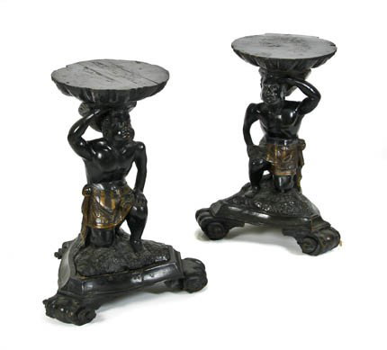 A Pair of Venetian Carved and Polychrome Decorated: A Pair of Venetian Carved and Polychrome Decorated Figural Pedestals, in the form of kneeling blackamoors supporting the shell formed tops, raised on tripartite bases. Height 19 inches.
