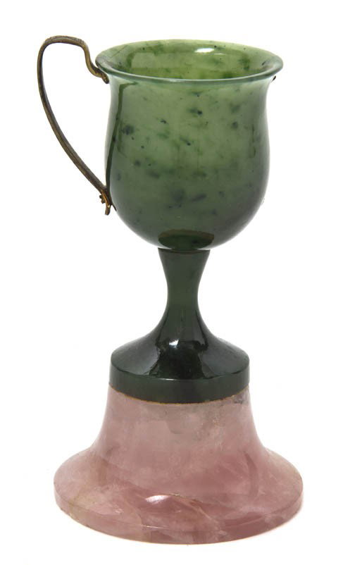 A Carved Jadeite and Rose Quartz Chalice, Height o: A Carved Jadeite and Rose Quartz Chalice, with applied strap handle. Height overall 4 3/8 inches.