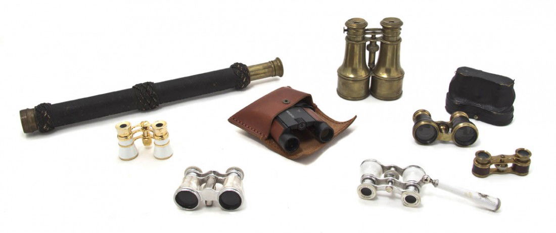 A Collection of Optical Articles, Length of first: A Collection of Optical Articles, comprising a leather-clad brass telescope, together with two pairs of binoculars and five pairs of opera glasses. Length of first when extended 22 3/8 inches.