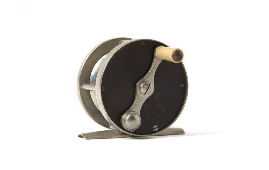 An Early Hard Rubber Trout Reel,: An Early Hard Rubber Trout Reel, 60 yard model.