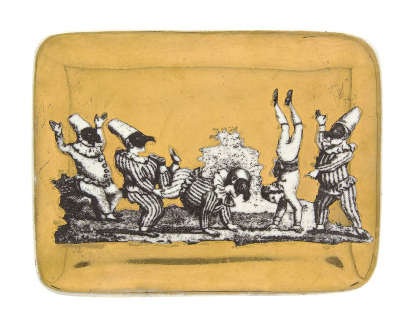 An Italian Ceramic Card Tray, Fornasetti, Width 5: An Italian Ceramic Card Tray, Fornasetti, Punchinello, depicting five acrobats. Width 5 1/2 inches.