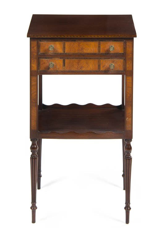 An American Mahogany Work Table, Height 29 x width: An American Mahogany Work Table, having a rectangular top over two drawers above a medial shelf, raised on tapering fluted legs. Height 29 x width 16 1/4 x depth 16 1/2 inches.