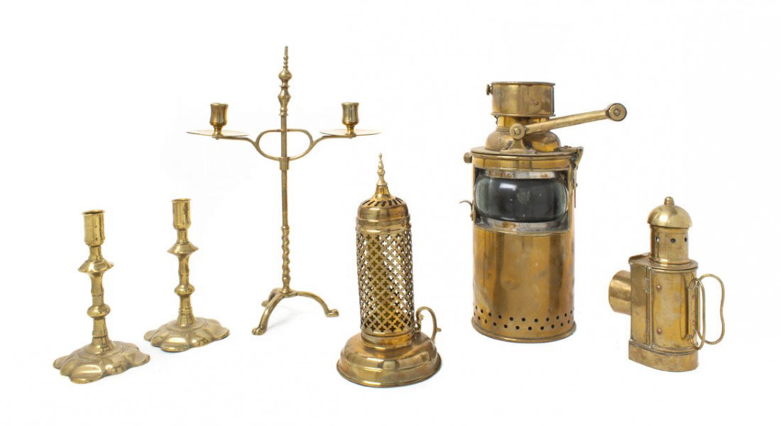 A Collection of Brass Lighting Articles, Height o: A Collection of Brass Lighting Articles, comprising lanterns, chambersticks and candlesticks; 15 items total. Height of tallest 16 1/2 inches.