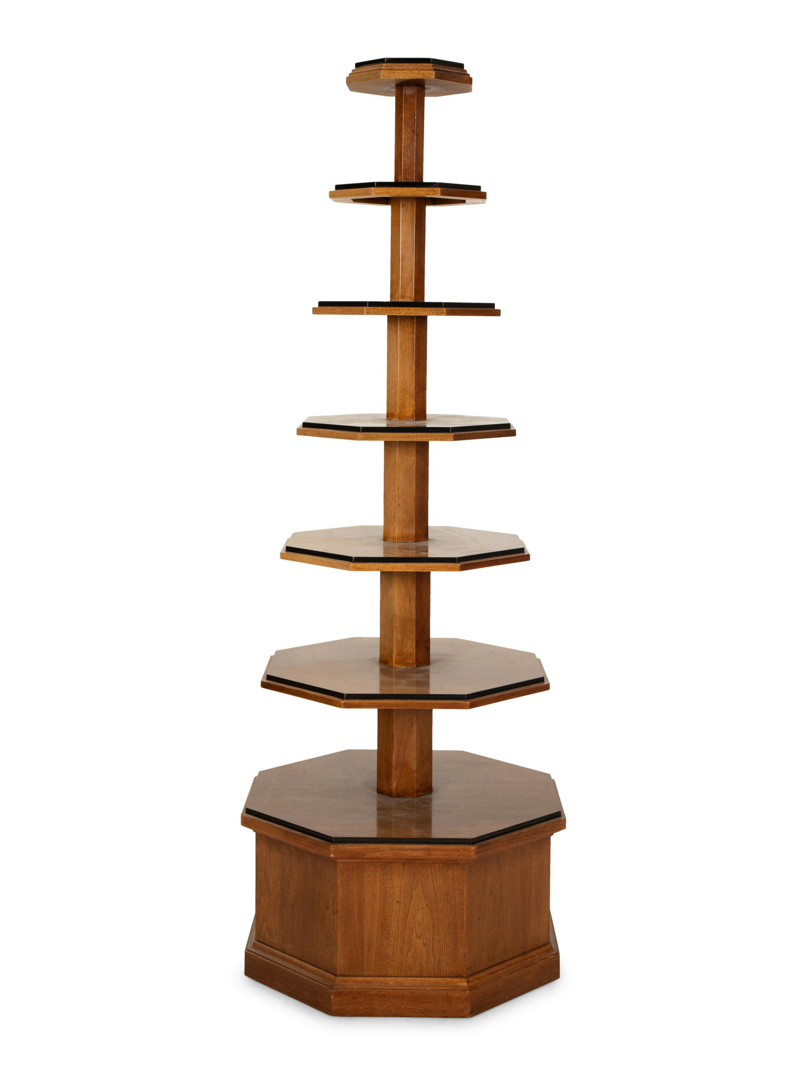 A George III Style Mahogany Whatnot: A George III Style Mahogany Whatnot 19th Century having three octagonal shelves and resting on a conforming base.Height 78 1/2 x diameter 28 inches. Property from the Estate of Mr. Alfred A. Funai