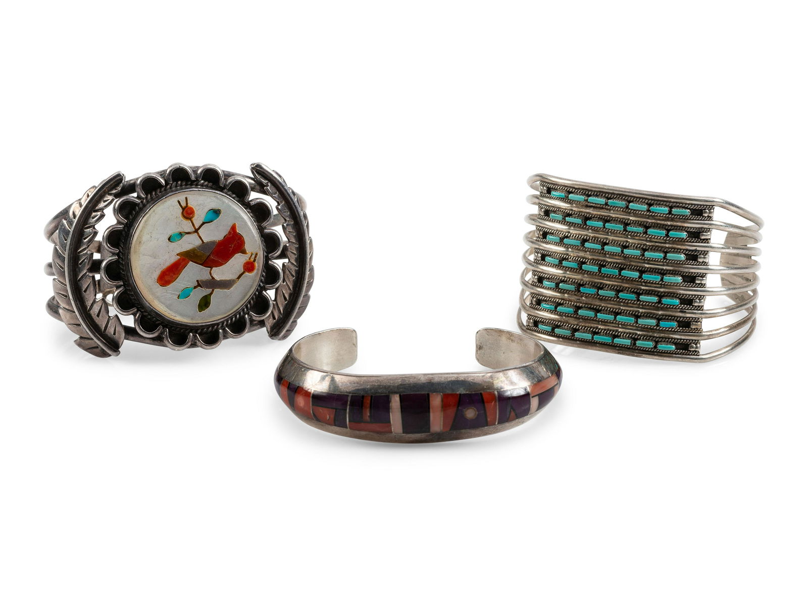 Navajo and Zuni Cuff Bracelets: Navajo and Zuni Cuff Bracelets second half 20th century lot of 3, includes: a tapered cuff, set with pink and red coral, sugilite, and jet; signed JIM HARRISON marked STERLING cuff width 5/8 inch, int