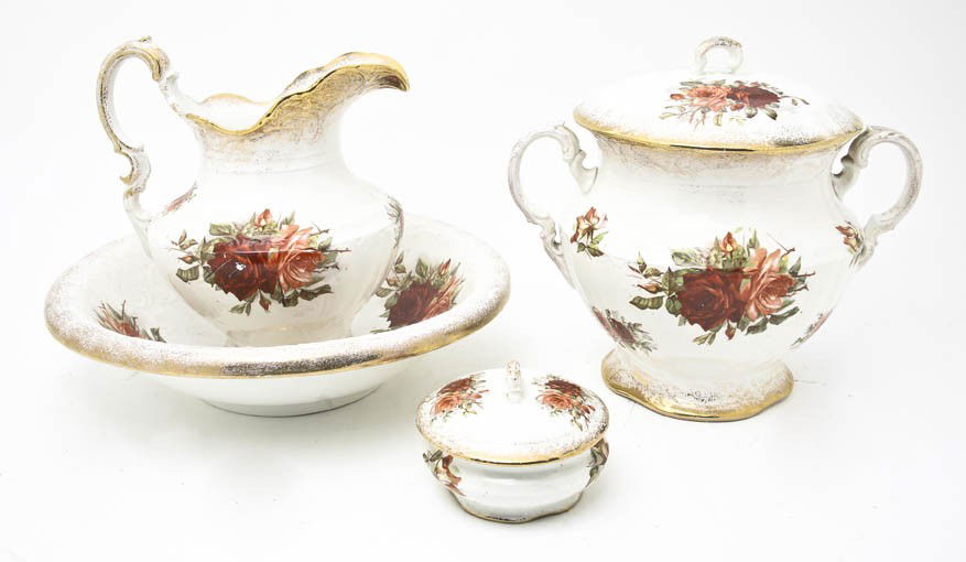 A Victorian Ceramic Wash Set, Taylor & Smith, Diam: A Victorian Ceramic Wash Set, Taylor & Smith, comprising a basin, pitcher, slop bucket and cosmetic jar. Diameter of first 16 inches.
