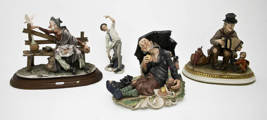 Three Capodimonte Hobo Figurines, Height of talles: Three Capodimonte Hobo Figurines, together with one other. Height of tallest 8 1/3 inches.