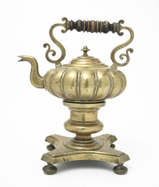 A Brass Kettle on Stand, Height 13 1/4 inches.: A Brass Kettle on Stand, set on a quadripartite base. Height 13 1/4 inches. Property from the Estate of Norma Seidman, Lincolnwood, Illinois