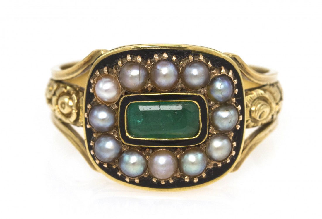 A Victorian Yellow Gold, Emerald, Pearl and Enamel R: A Victorian Yellow Gold, Emerald, Pearl and Enamel Ring, containing one octagonal step cut emerald in a black enamel border surrounded by 12 split pearls, trifurcated shank with central foliate engrav