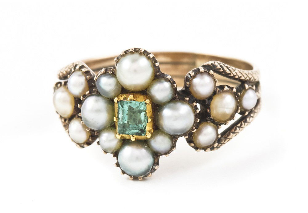 A Victorian Yellow Gold, Pearl and Emerald Ring, 2.: A Victorian Yellow Gold, Pearl and Emerald Ring, containing one rectangular step cut emerald and numerous split pearls within an engraved yellow gold wireform setting. 2.10 dwts. Property from the Est