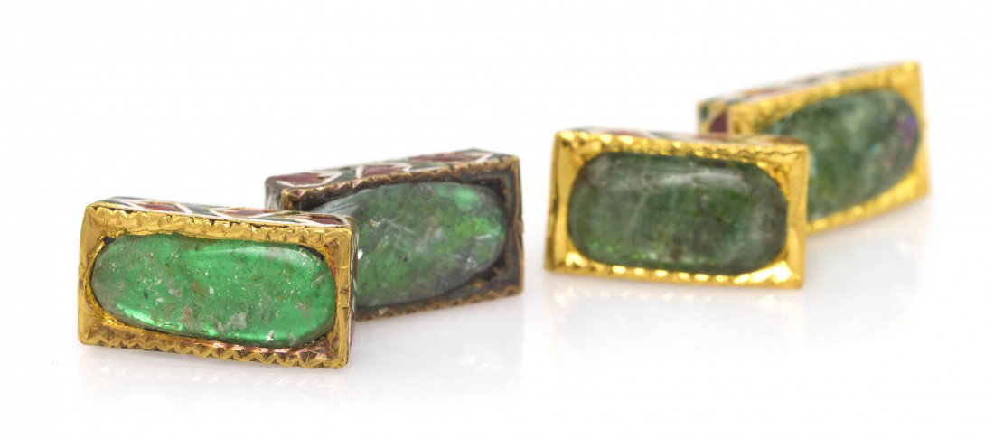 A Pair of Mughal Style Emerald and Polychrome Enam: A Pair of Mughal Style Emerald and Polychrome Enamel Cufflinks, consisting of four gold tone plaques decorated with polychrome enamel in a foliate motif, plaques measure approximately 15.90 x 8.75 mm,