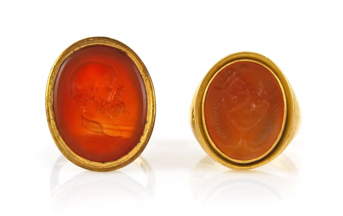 A Group of Yellow Gold and Sardonyx Intaglio Rings: A Group of Yellow Gold and Sardonyx Intaglio Rings, including a 14 karat ring and a 10 karat ring.