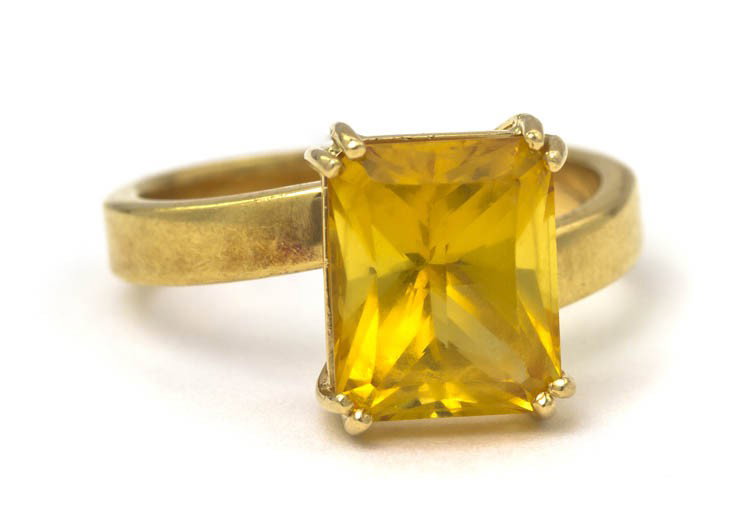 An 18 Karat Yellow Gold and Yellow Beryl Handmade : An 18 Karat Yellow Gold and Yellow Beryl Handmade Ring, containing one modified octagonal brilliant cut yellow beryl weighing approximately 3.25 carats within a handmade gold ring setting. Hand inscri