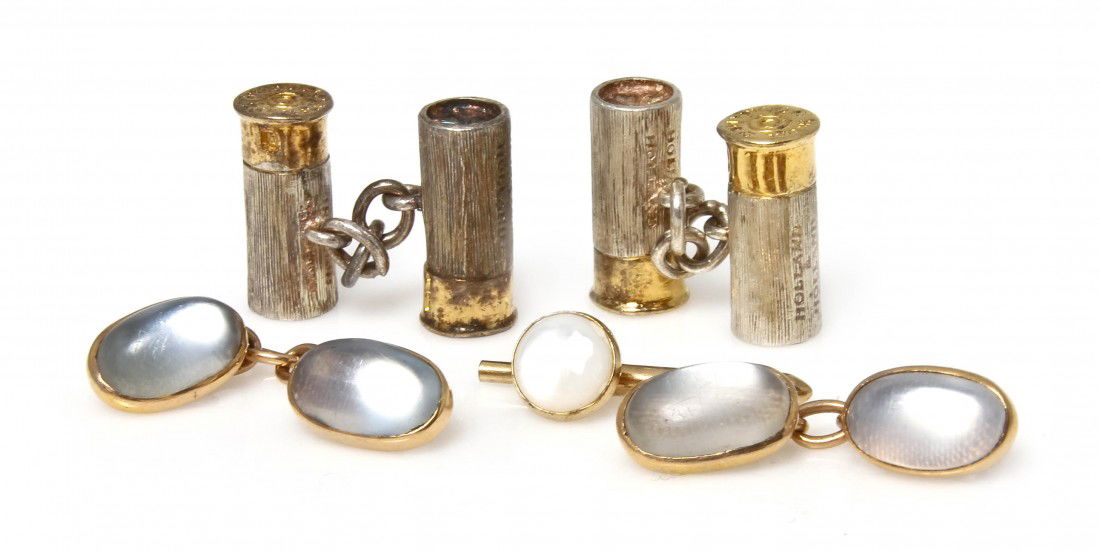 A Group of Cufflink Jewelry, 20.90 dwts.: A Group of Cufflink Jewelry, consisting of a pair of shotgun shell motif sterling cufflinks with gold tone accents signed HOLLAND & HOLLAND, a pair of yellow gold and moonstone chain link cufflinks wi