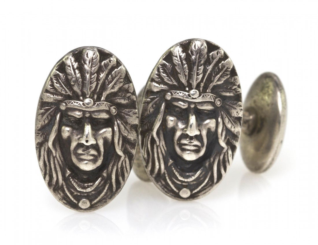 A Pair of Sterling Silver Indian Chief Cufflinks,: A Pair of Sterling Silver Indian Chief Cufflinks, in an oval shape measuring approximately 20.00 x 13.00 mm. 4.20 dwts. Property from the Collection of Governor Jim Thompson, Chicago, Illinois