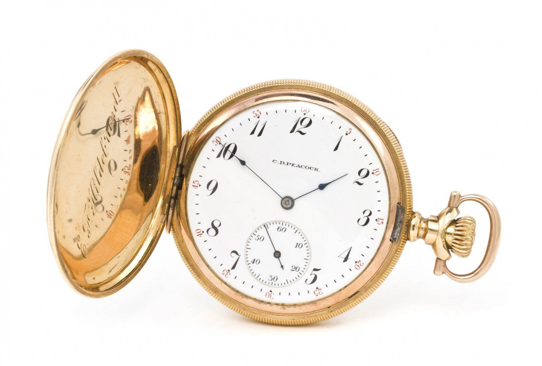A Gold Tone Mechanical Pocket Watch, C.D. Peacock: A Gold Tone Mechanical Pocket Watch, C.D. Peacock, white porcelain dial, Arabic numerals with outer minute register, blued steel spade hands, small seconds at 6 o'clock, guilloche finish case, adjuste
