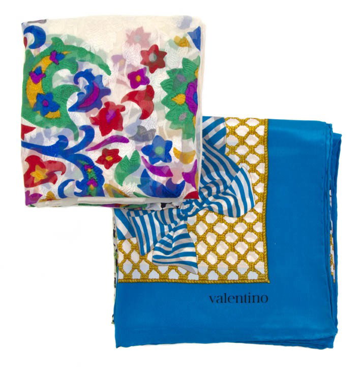 An Yves Saint Laurent Silk Scarf,: An Yves Saint Laurent Silk Scarf, together with a Valentino silk scarf.