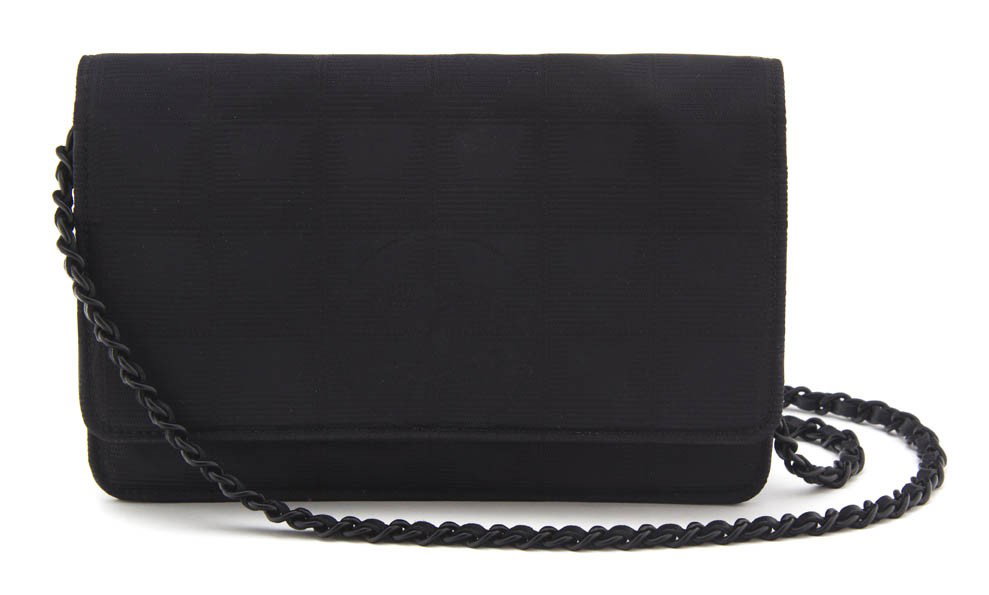 A Chanel Black Canvas 'Wallet on a String' Bag. 8 : A Chanel Black Canvas 'Wallet on a String' Bag. Stamped: Chanel. 8 x 5 inches.