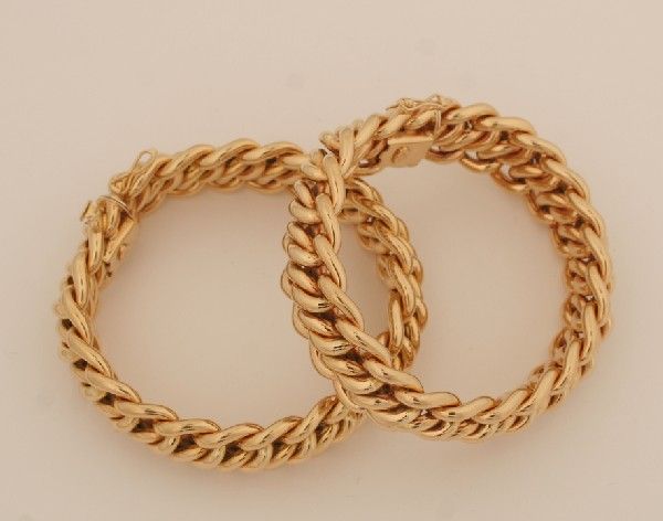 A Pair of Lady's 18 Karat Yellow Gold Link Bracel: A Pair of Lady's 18 Karat Yellow Gold Link Bracelets, Leon Martin, stamped "750 FRANCE LM".57.60 dwts.