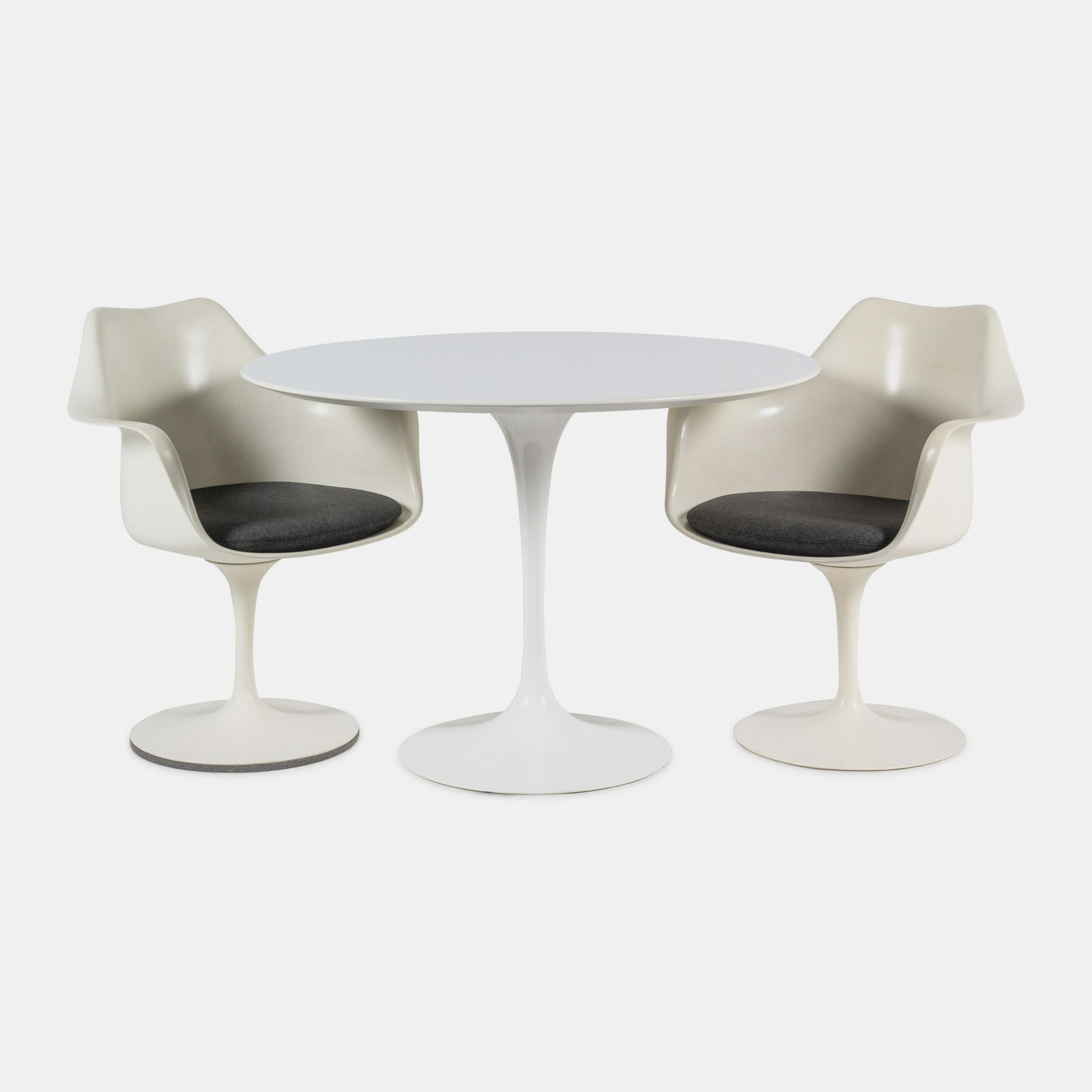 Eero Saarinen (Finnish-American, 1910-1961) Tulip Dining Table with Two Tulip ArmchairsKnoll, USA (1 of 5)