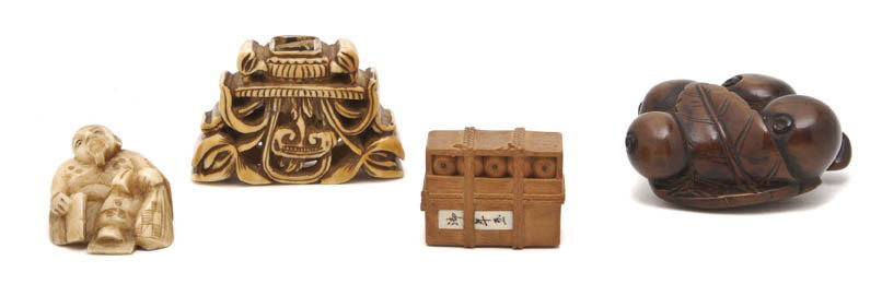 Three Japanese Netsukes, Length of first 2 1/4 inc: Three Japanese Netsukes, comprising an ivory figure, a carved wood cluster of cherries and a carved wood and ivory inset storage container, together with a Southeast Asian carved ivory ornament, two s