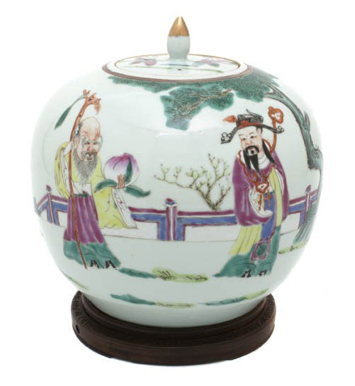 A Chinese Porcelain Ginger Jar, Height 10 1/4 inch: A Chinese Porcelain Ginger Jar, having a polychrome ceremonial scene depicting three men on a white ground, raised on a hardwood base. Height 10 1/4 inches. Property from the Estate of Marilyn Gaynor,