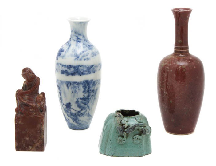 A Group of Diminutive Asian Articles, Height of ta: A Group of Diminutive Asian Articles, comprising a Chinese glazed turquoise pottery dragon cast inkwell, a sang de boeuf baluster form porcelain vase and a Chinese carved soapstone chop stamp carved w