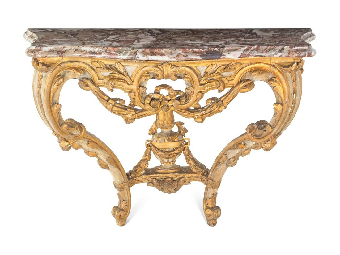 An Italian Rococo Parcel-Gilt and White-Painted Carved Wood Marble-Top Console Table (1 of 4)