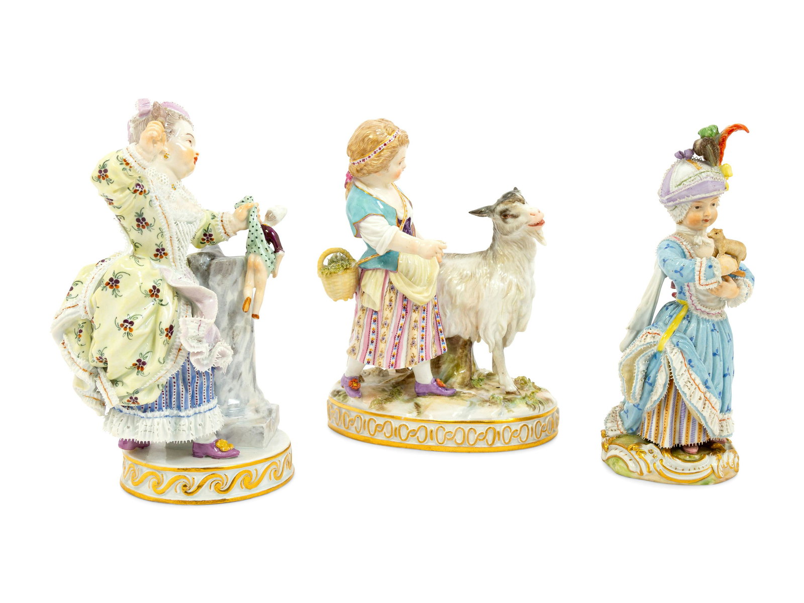 A Group of Meissen Porcelain Girls: A Group of Meissen Porcelain Girls 19th Century bearing double crossed swords in underglaze blue, with incised initials JP 81 on the girl with the goat, E 95 on the girl with the doll and C 90 on the