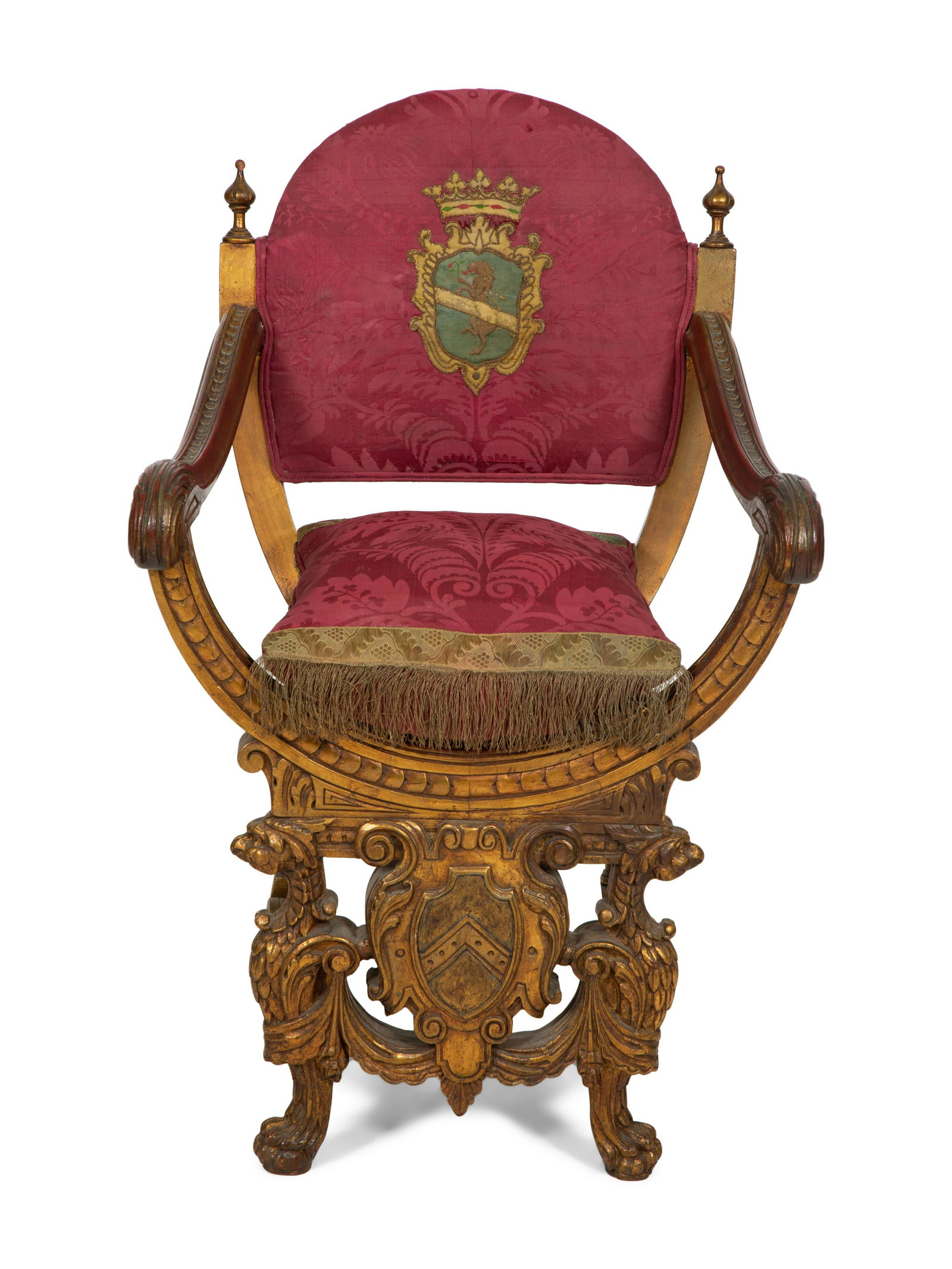 An Italian Giltwood Savonarola Armchair: An Italian Giltwood Savonarola Armchair 19th Century with upholstered back and seat, the back with an applied embroidered coat of arms. Height 38 x width 24 x depth 24 inches. This lot is located in P