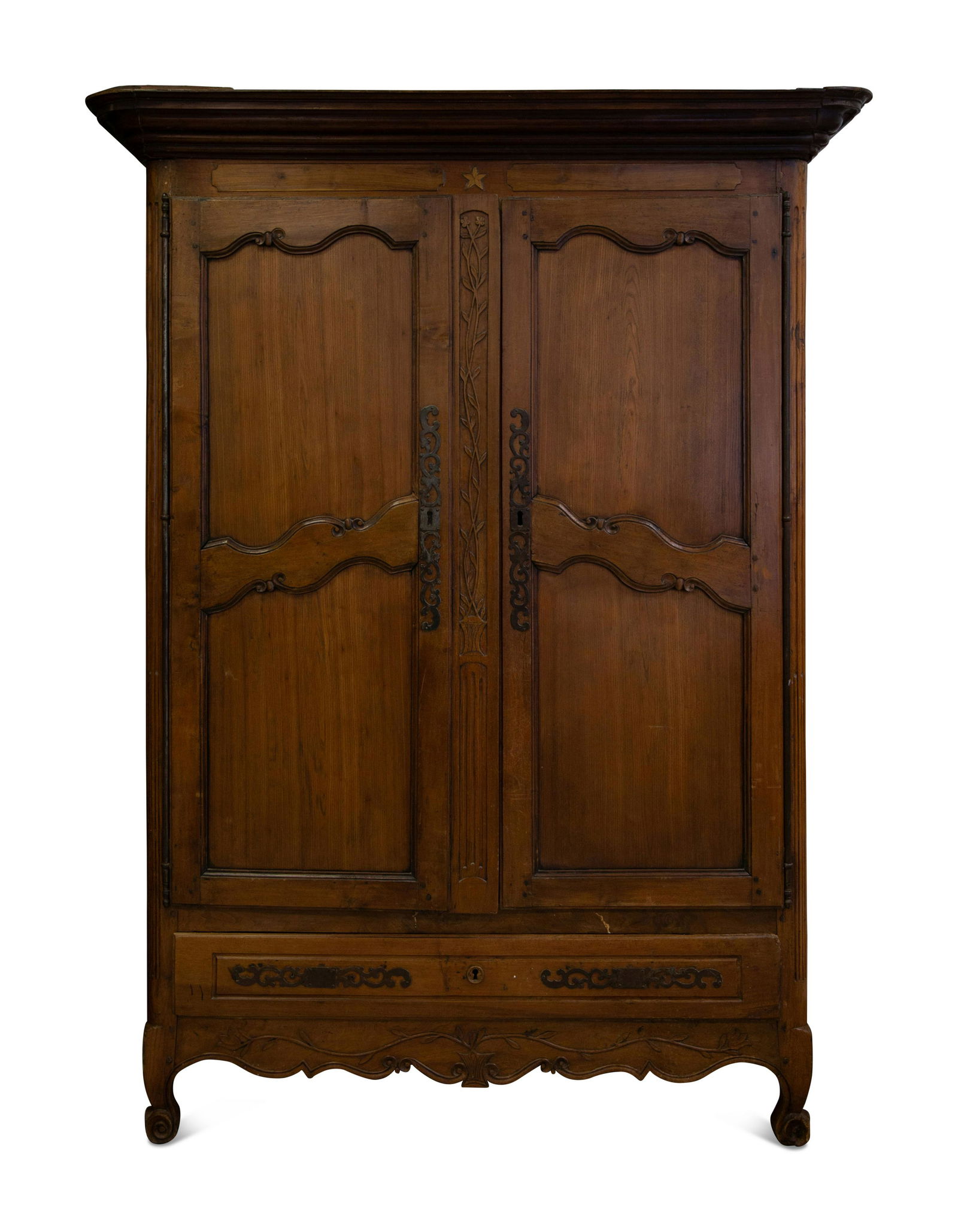 A French Provincial Carved Walnut Armoire: A French Provincial Carved Walnut Armoire Early 19th Century the interior with a later addition of six linen drawers and two shelves.Height 90 x width 66 x depth 29 inches. This lot is located in Palm