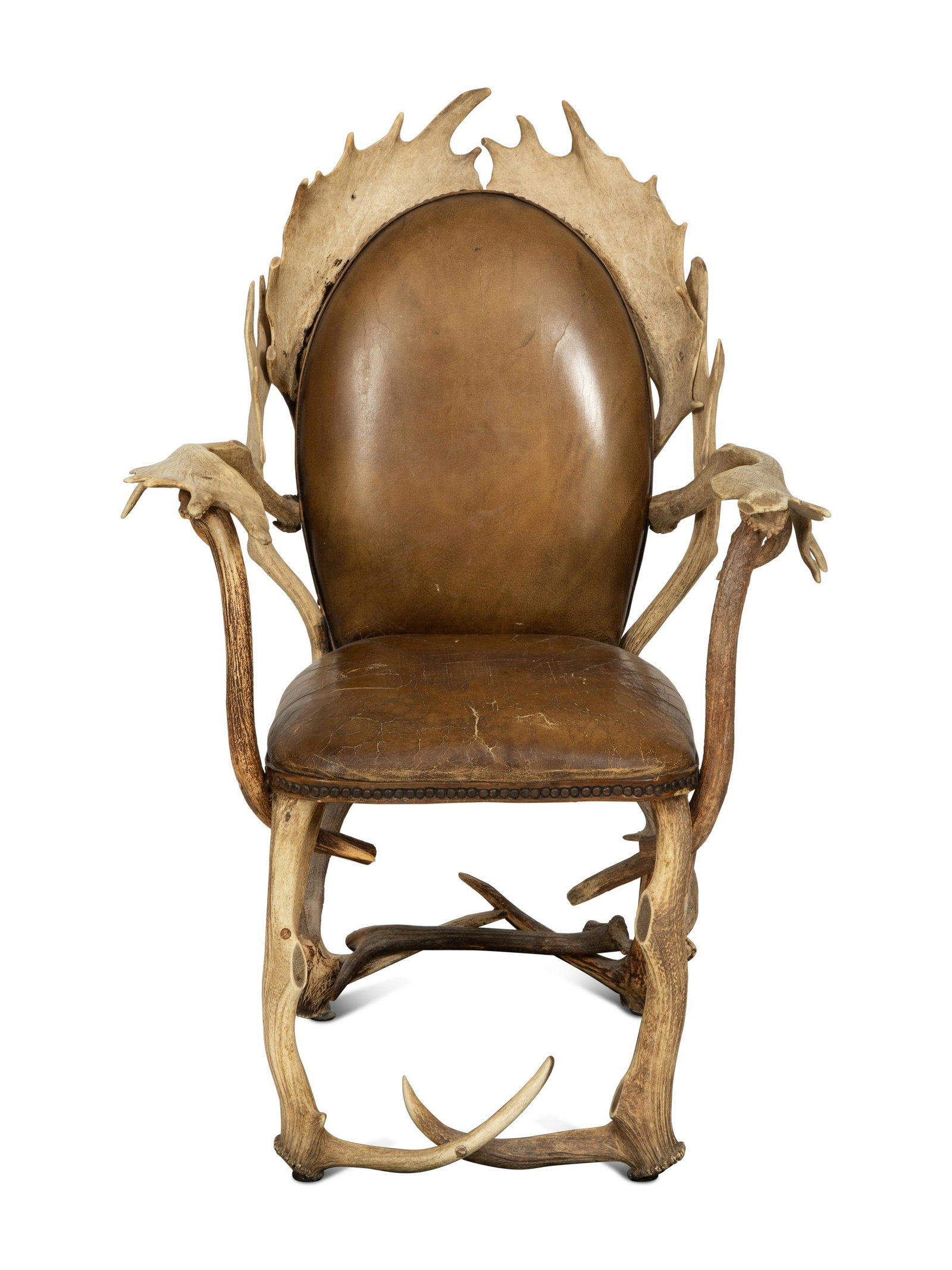 A Victorian Stag Horn Armchair: A Victorian Stag Horn Armchair 19th Century with leather upholstery back panel and seat. Height 43 1/4 x width 29 1/2 x depth 23 inches. This lot is located in Palm Beach.