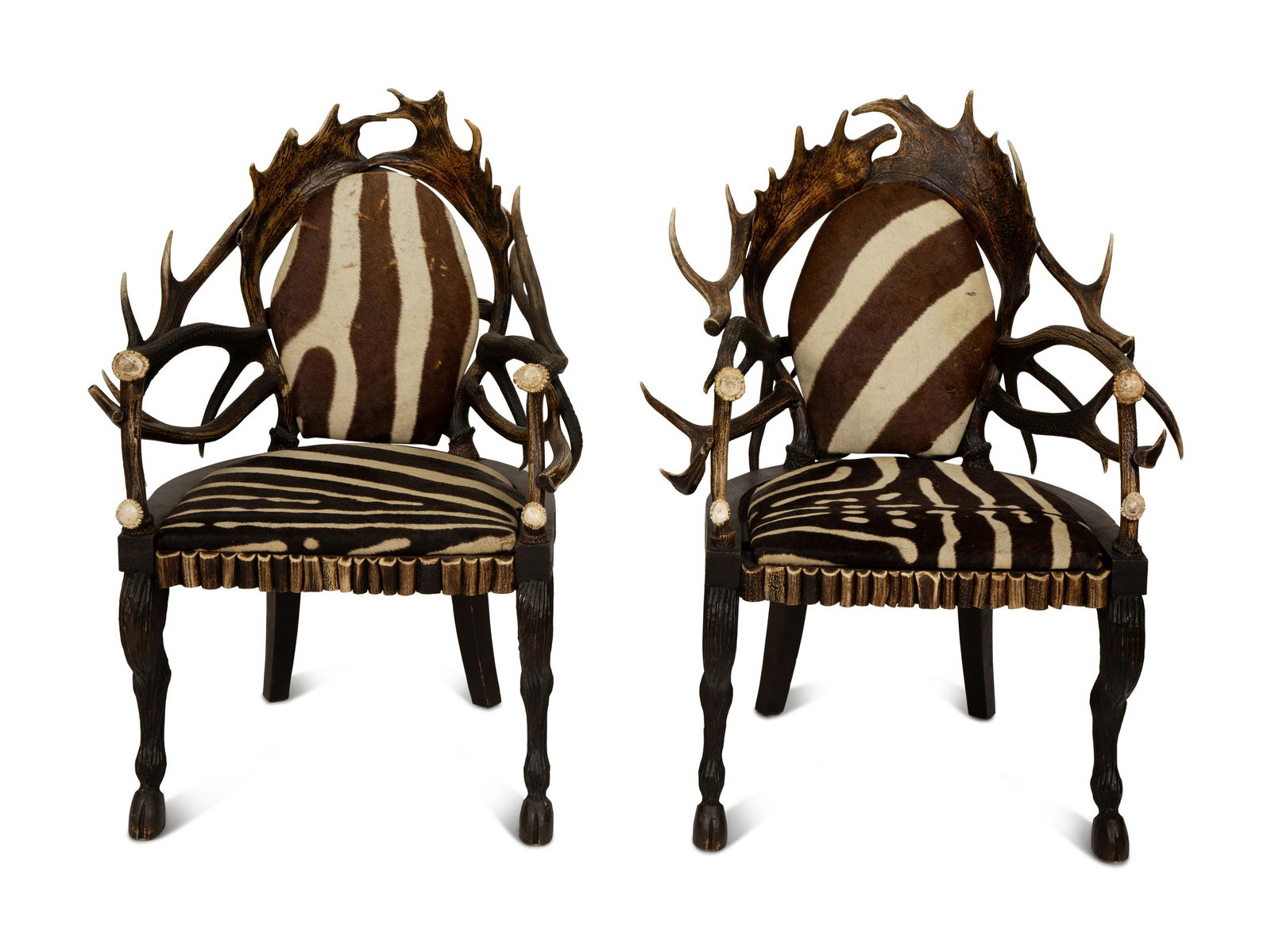 A Pair of Stag Antler Arm Chairs with Zebra Hide Upholstery (1 of 6)
