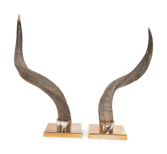 A Pair of Anthony Redmile Impala Horns Mounted on Bronzed Metal Bases: A Pair of Anthony Redmile Impala Horns Mounted on Bronzed Metal Bases 20th Century Height of taller example 20 1/4 inches This lot is located in Palm Beach. Property of a Palm Beach Collector
