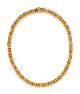 LALAOUNIS, YELLOW GOLD NECKLACE: LALAOUNIS, YELLOW GOLD NECKLACE Consisting of fluted beads measuring approximately 6.00 mm wide. 15 inches long. Stamp: ILIAS LALAOUNIS 750 (maker's mark) GREECE. Gross weight: 23.70 dwt. A Private