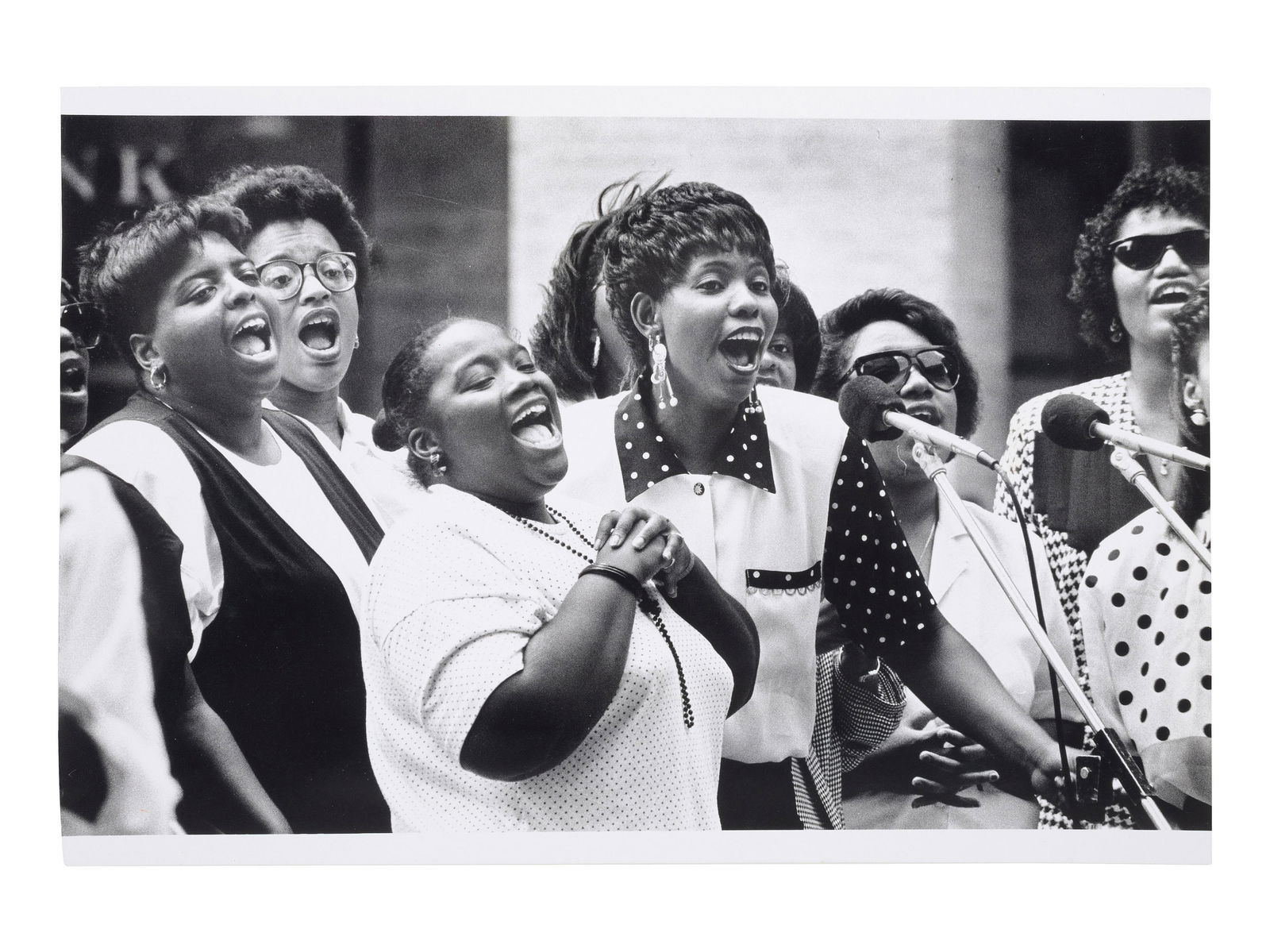 [EARLY PHOTOGRAPHY] -- [MUSIC]. A group of 2 photographs taken by African American photographers Al: [EARLY PHOTOGRAPHY] -- [MUSIC]. A group of 2 photographs taken by African American photographers Al SMITH (1916-2008) and John WHITE (b. 1945), incl. young dancers and gospel singers. Al Smith (1916-2