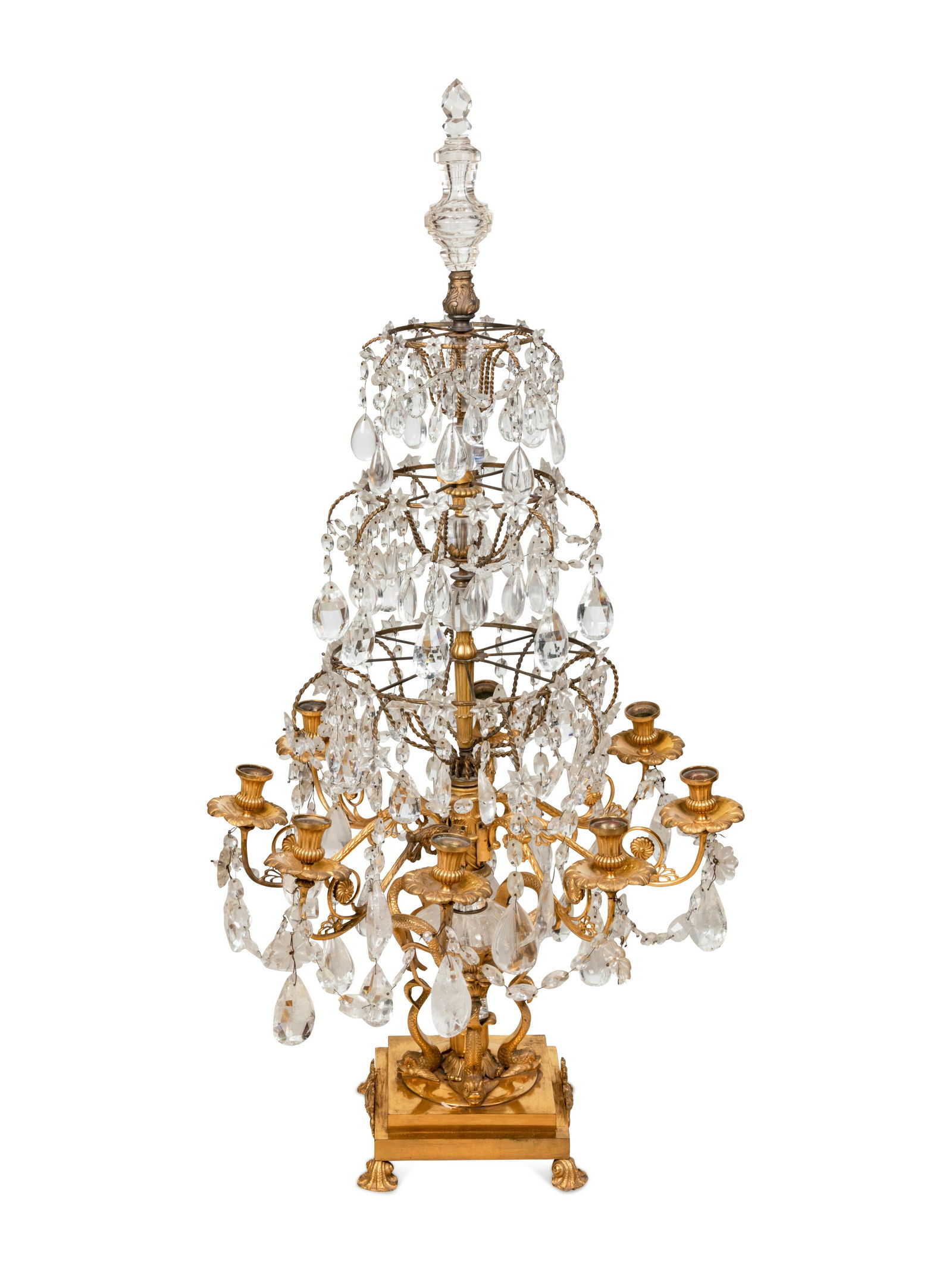 An Empire Style Four-Tier Gilt Bronze and Rock Crystal Eight-Light Girandole: An Empire Style Four-Tier Gilt Bronze and Rock Crystal Eight-Light Girandole 19th Century two sides of the base bearing the coat-of-arms of the House of Cowper with the motto TUUM EST. Height 50 3/4 i