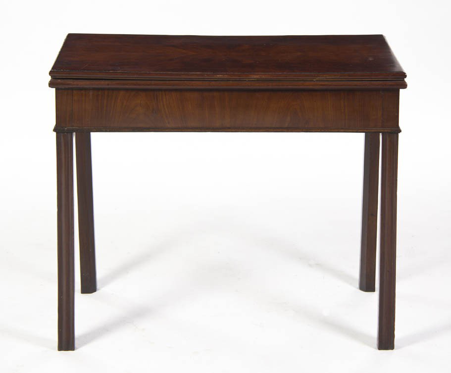 A Chippendale Style Mahogany Flip-Top Games Table, : A Chippendale Style Mahogany Flip-Top Games Table, the rectangular top with a molded edge opening to a felt lined playing surface over the plain frieze, raised on molded square legs. Height 29 1/4 x w