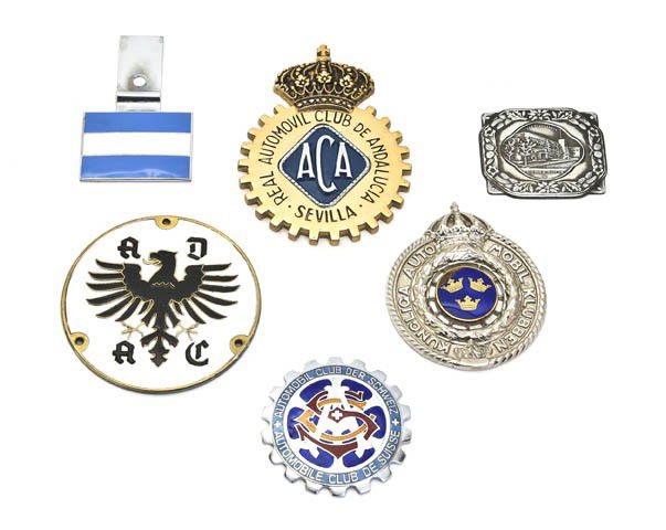 A Collection of Ten Automobile Club Tags, Average: A Collection of Ten Automobile Club Tags, including enameled examples. Average diameter 3 1/2 inches. Property from the Collection of Mr. and Mrs. Paul Helmer, Indian Wells, California