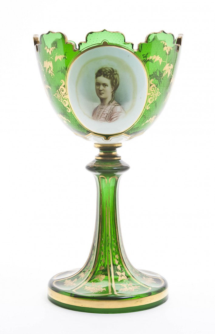 A Continental Glass and Enameled Chalice, Height 1: A Continental Glass and Enameled Chalice, having gilt foliate decoration throughout, the bowl centered with the bust of a woman, raised on a flared circular foot. Height 10 1/2 inches.