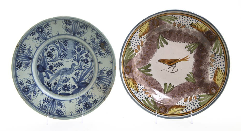 Two Continental Faience Chargers, Diameter of larg: Two Continental Faience Chargers, each of circular form centered with a bird. Diameter of larger 12 inches.